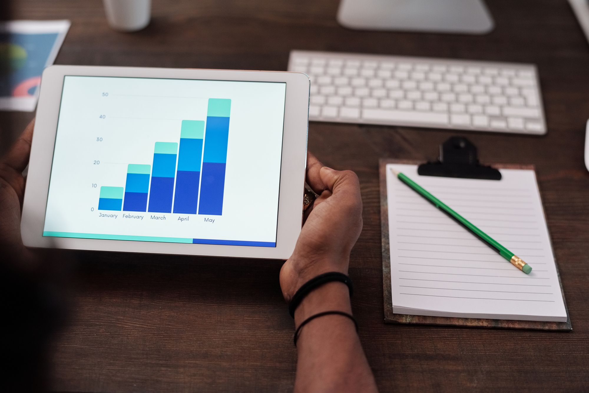 Content planning on a desk with a tablet