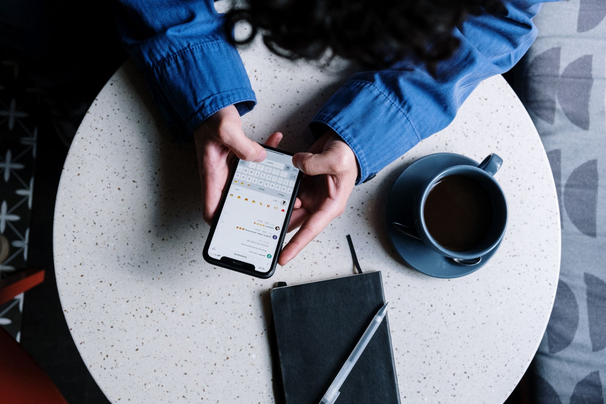 Person managing messages on a phone